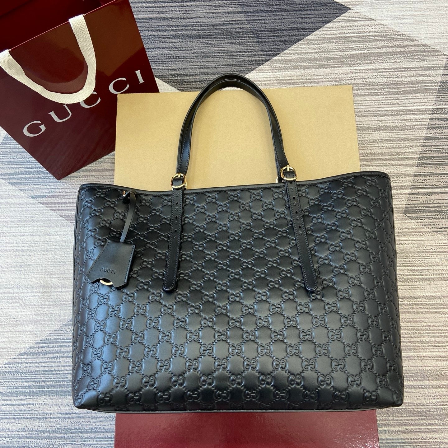 Gucci GG Emblem Debossed Leather Tote #335611