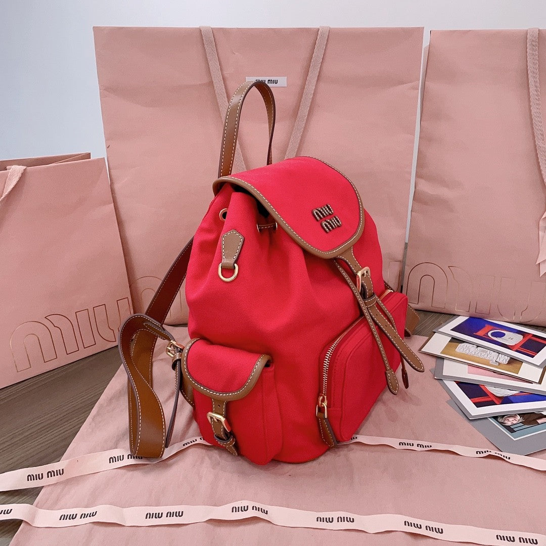 MiuMiu Women's Solid Color Canvas Patchwork Cowhide Shoulder Bag Backpacks Bags #75843
