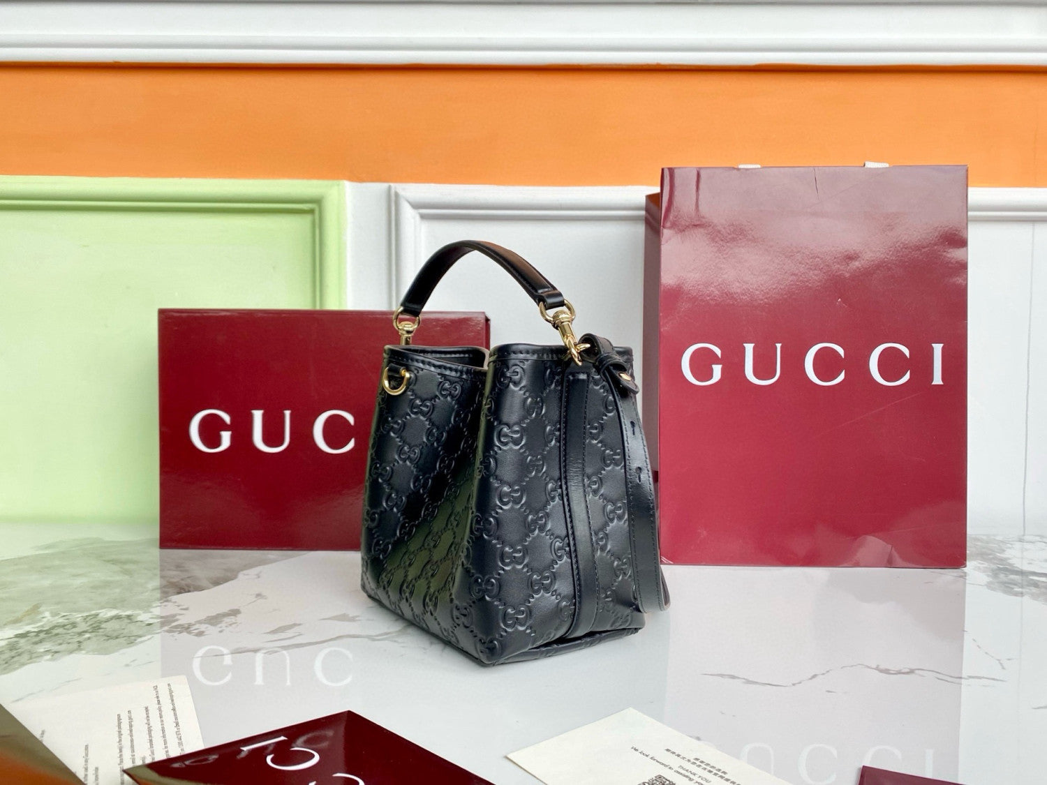 Gucci GG Emblem Small Bucket Bag #335481