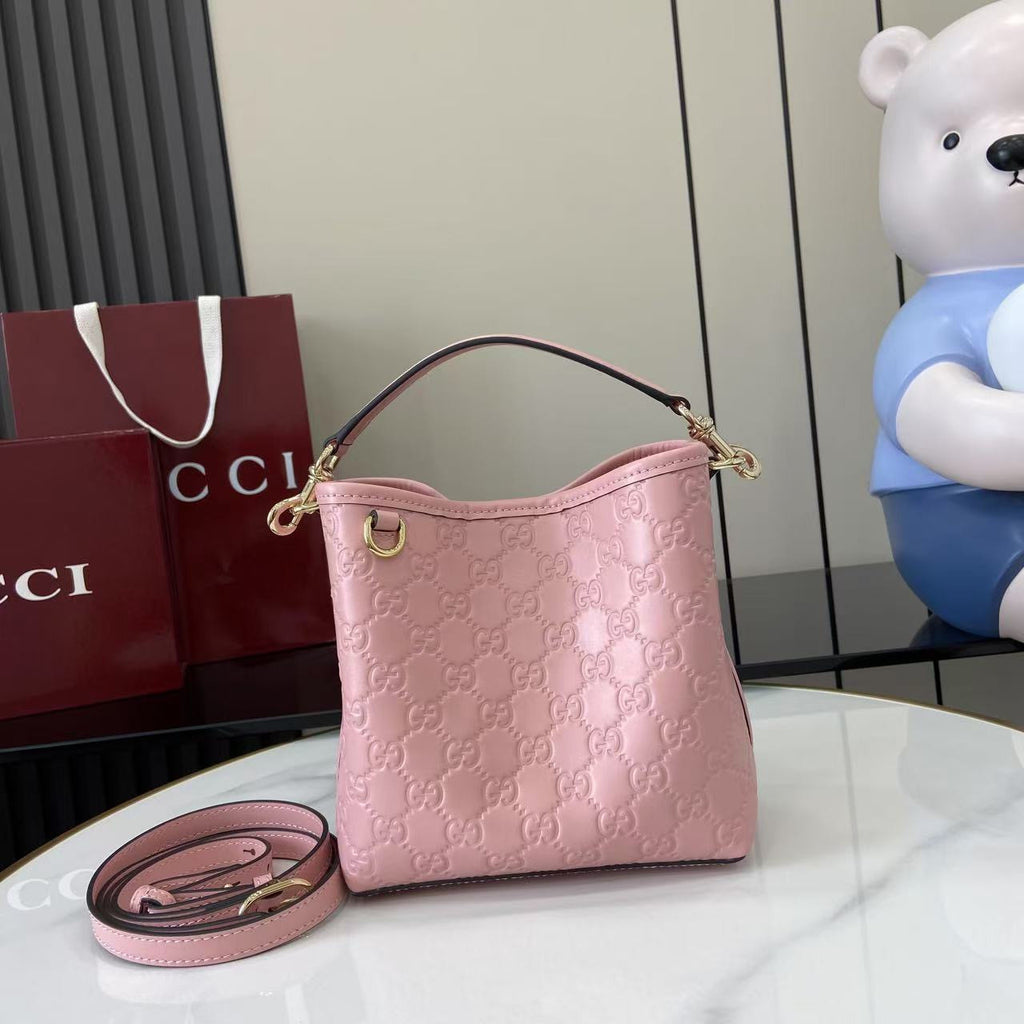Gucci GG Emblem Small Bucket Bag Trendy Clutch Bag Crossbody Bag Small Size Gold Accents Elegant  #82388A