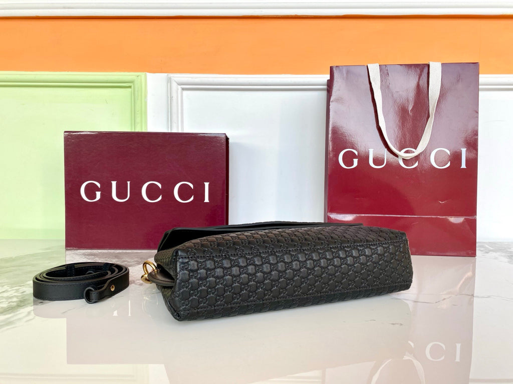 Gucci Medium shoulder bag with chain in black GG leather #336824