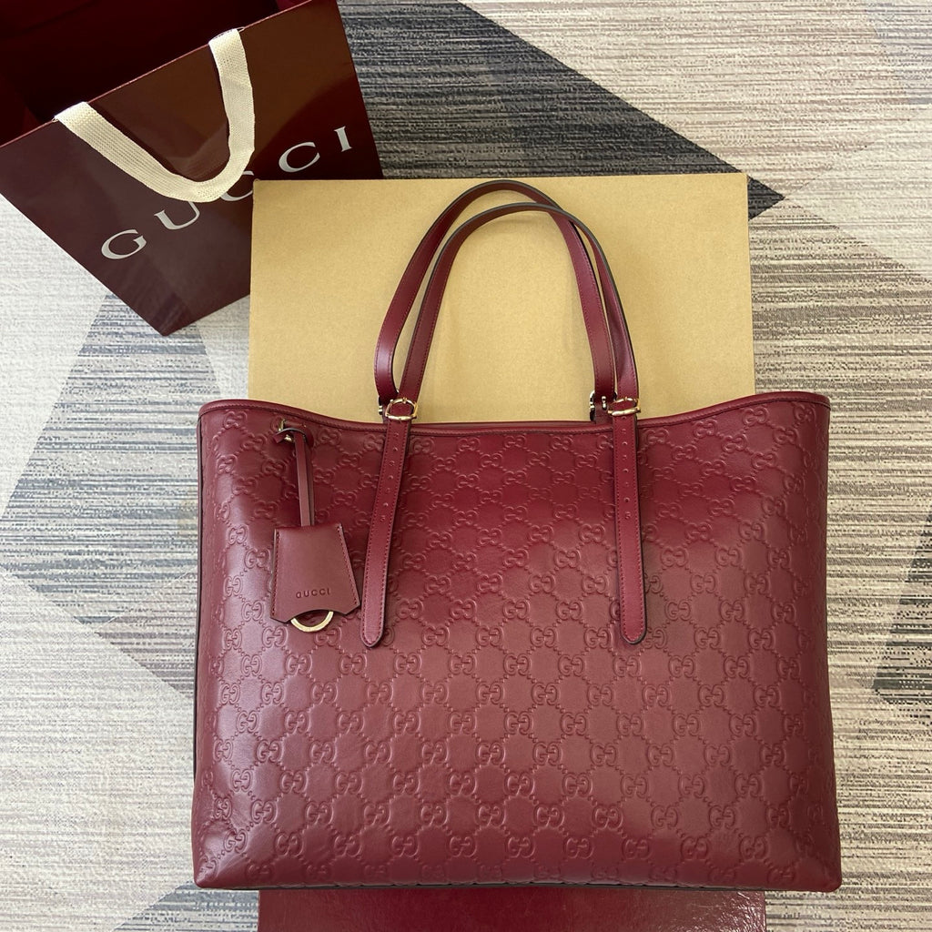 Gucci GG Emblem Debossed Leather Tote #335611