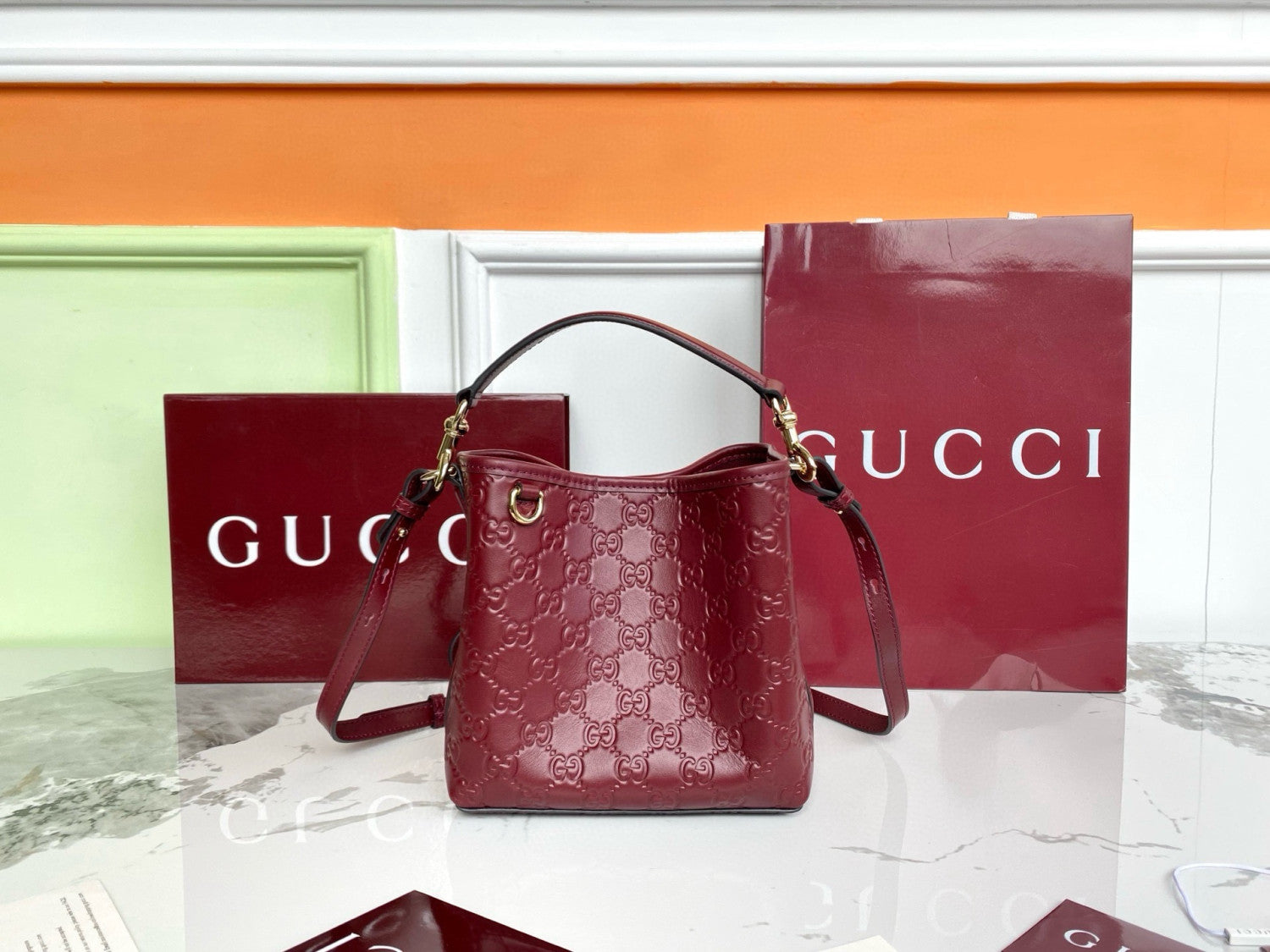Gucci GG Emblem Small Bucket Bag Trendy Clutch Bag Crossbody Bag Small Size Gold Accents Elegant  #82388A