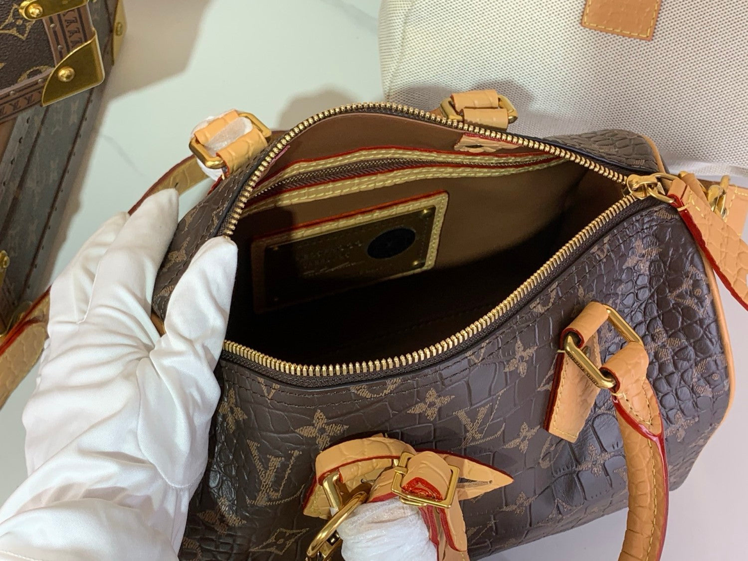 Louis Vuitton Speedy Bandoulière 25 Monogram Leather Handbag Coffee Brown Features Polished Metal Hardware A Lambskin Lining. And An Internal Signature Tag #196001