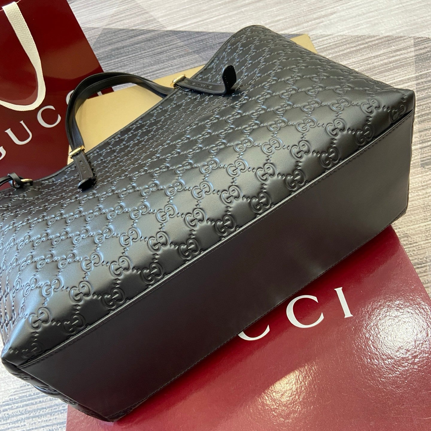 Gucci GG Emblem Debossed Leather Tote #335611