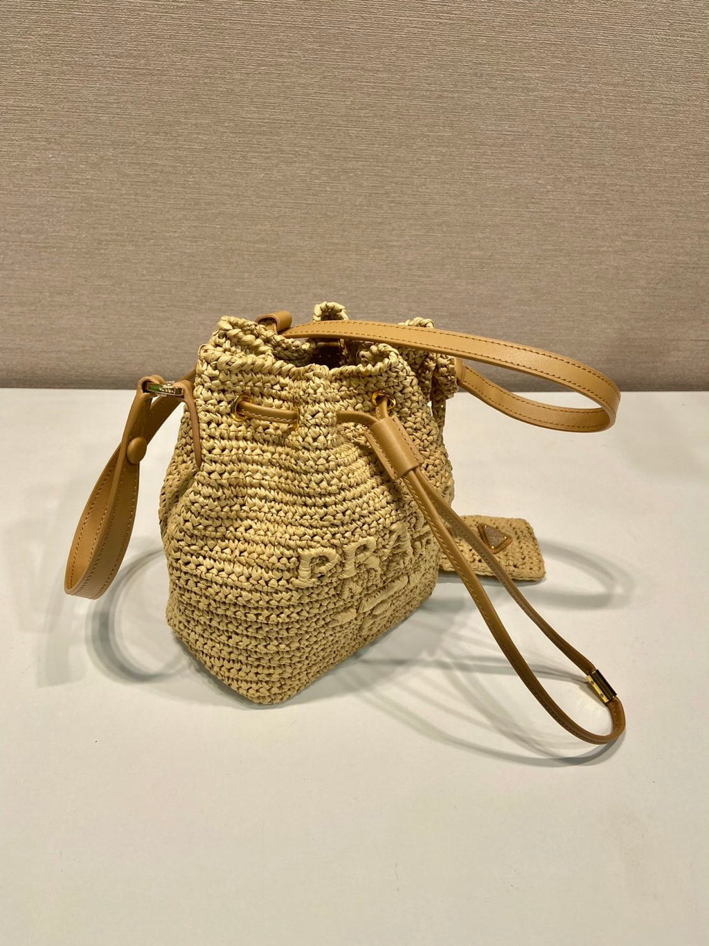 Prada Women's Logo Embroidered Adjustable Detachable Shoulder Strap Lafite Grass Patchwork Leather Bucket Bag Mini Handheld One Shoulder Crossbody Bag  Bags #196301