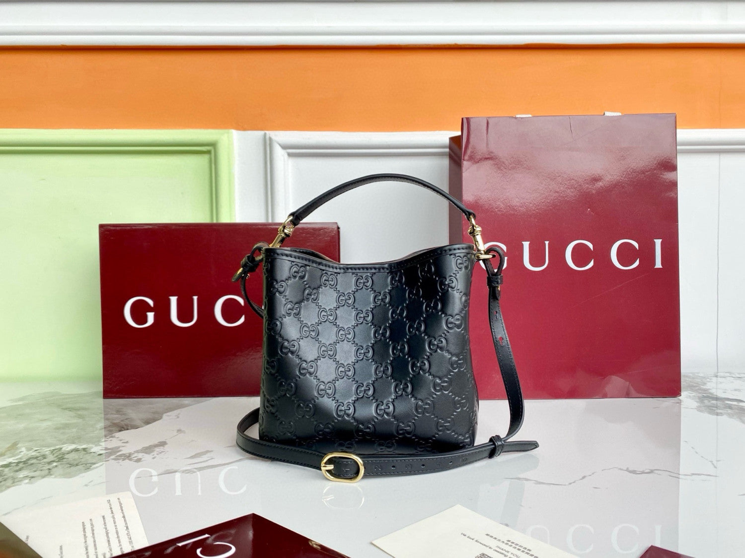 Gucci GG Emblem Small Bucket Bag #335481