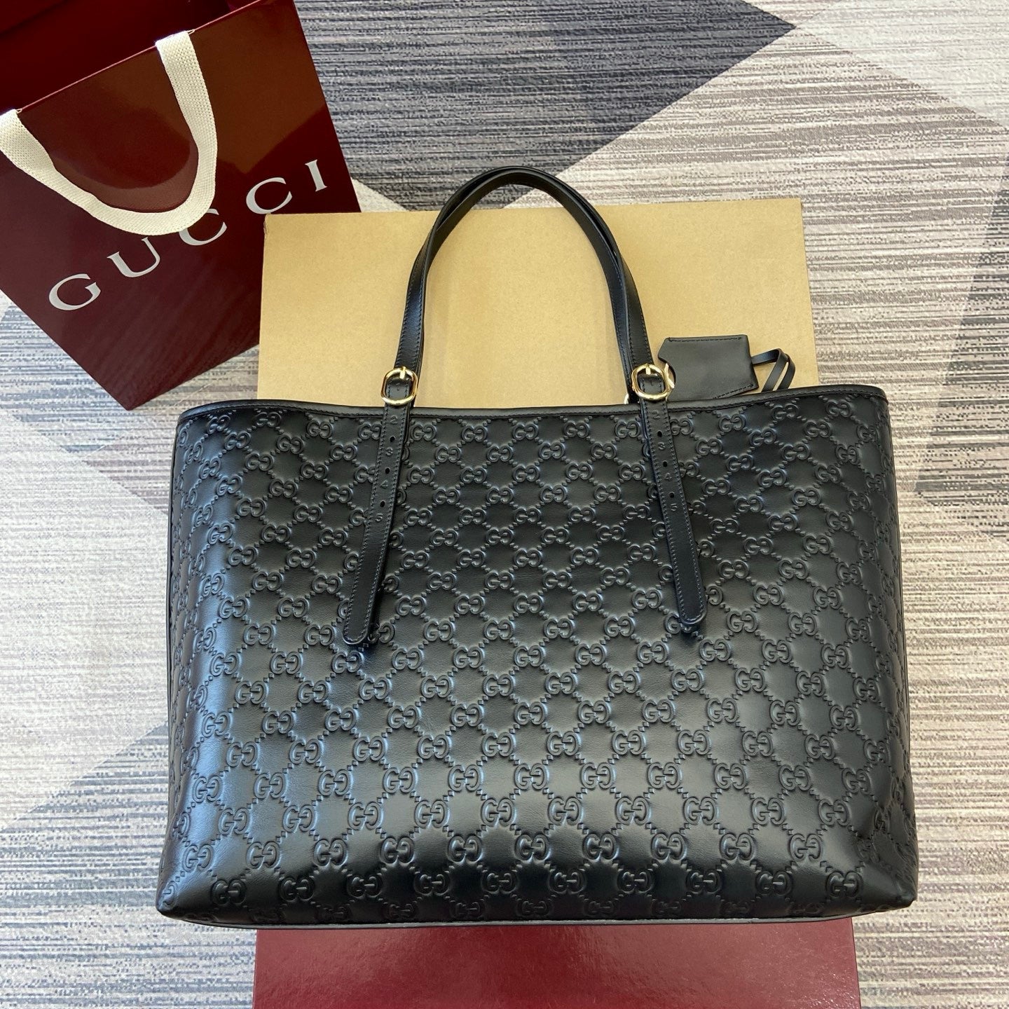 Gucci GG Emblem Debossed Leather Tote #335611