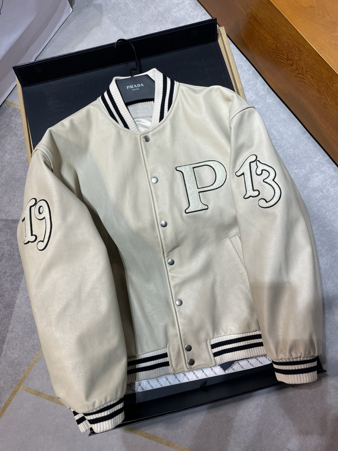 Prada Men's and Women's Spring and Autumn Solid Color Letter Logo Applique Zipper Leather Long Sleeve Jacket #73932