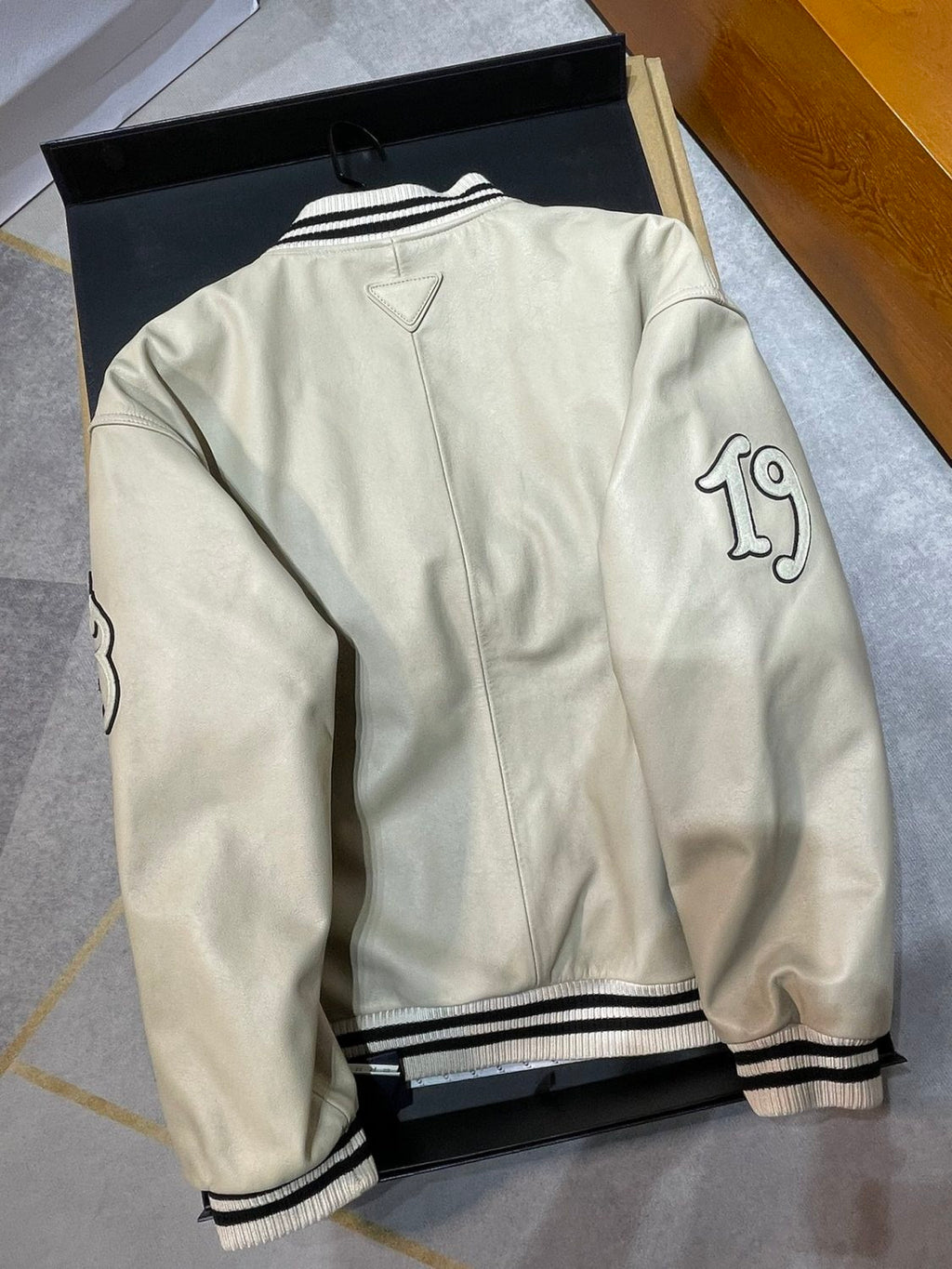 Prada Men's and Women's Spring and Autumn Solid Color Letter Logo Applique Zipper Leather Long Sleeve Jacket #73932