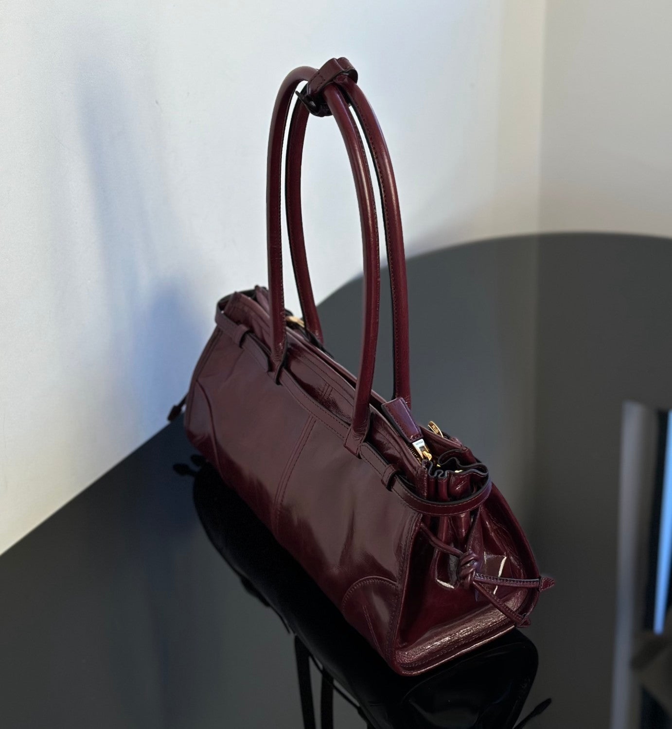 Prada Soft Lux new Bordeaux red motorcycle bag. authentic quality. made of waxed leather. with long handles and a detachable long shoulder strap #83132A