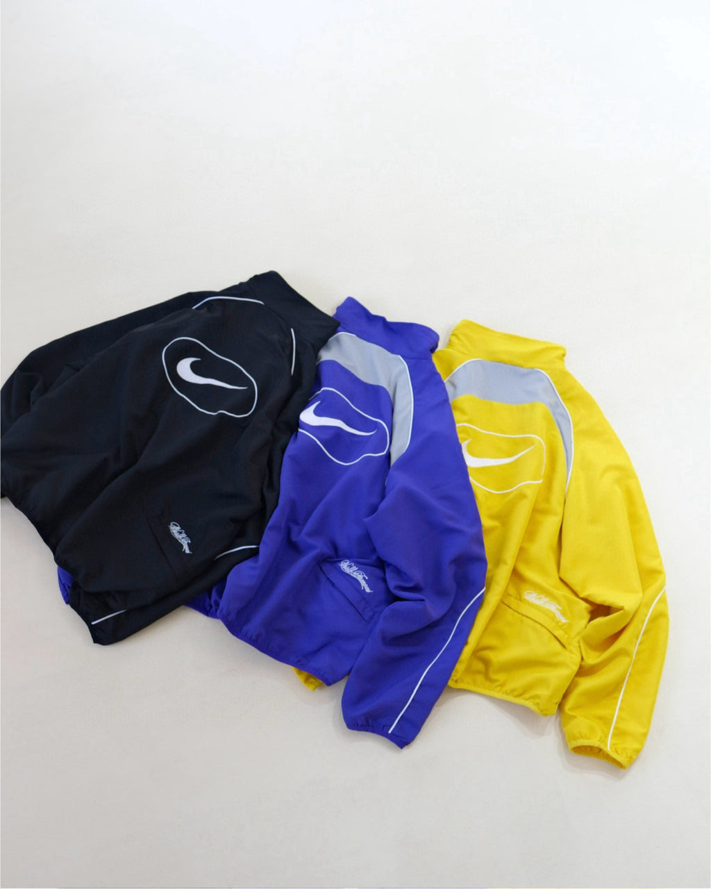 Supreme x Nike Men's Fashionable Cuff Embroidery Zipper Fitted Long-Sleeved Solid Color Sports Jacket Casual Striped Elastic Loose Sports Pants #81521
