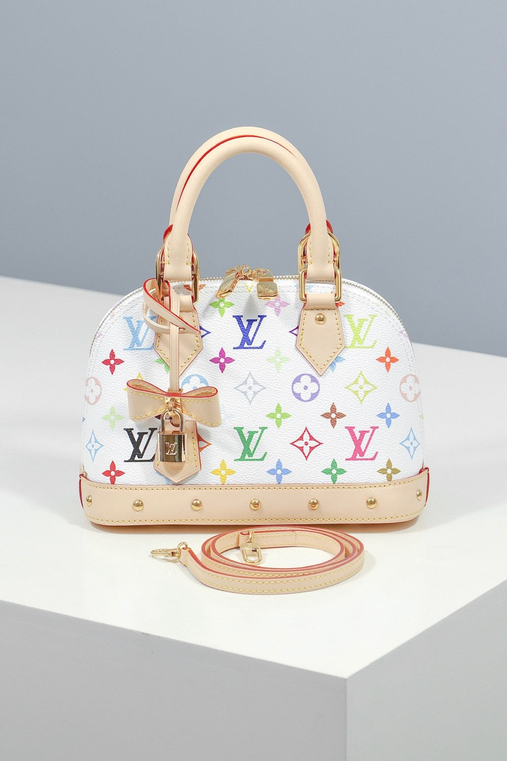 Louis Vuitton LV x TM ALMA BB Women's Letter Printed Zipper Closure Removable Shoulder Strap Calfskin Shoulder Crossbody Handbag Bag Bags #76676