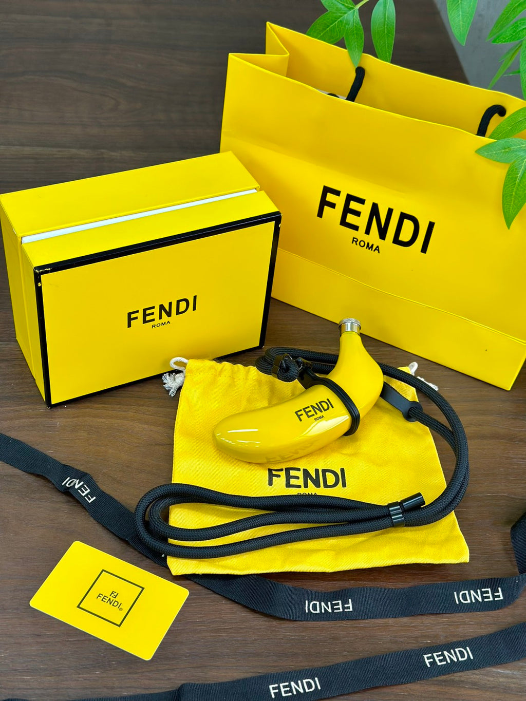 Fendi Limited Edition: Limited Stock Available Banana-print Flask Fashionable Mini Crossbody Bag Total Length: 150 Cm. Diameter: 8 Mm. Adjustable From 75 To 150 Cm. Comes In A Complete Gift Box Set Bags #197028