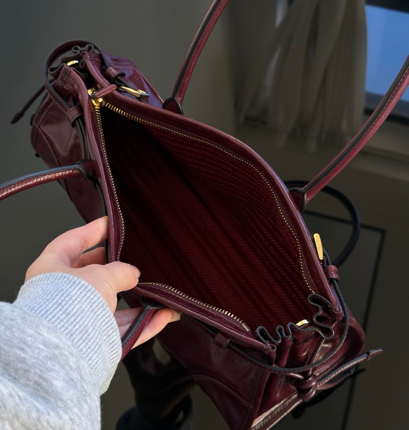 Prada Soft Lux new Bordeaux red motorcycle bag. authentic quality. made of waxed leather. with long handles and a detachable long shoulder strap #83132A