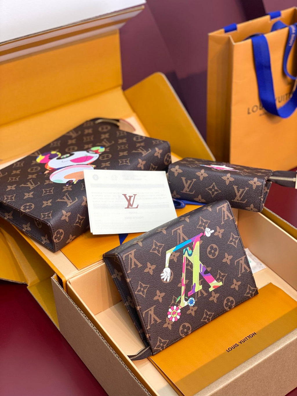 Louis Vuitton LV x TM Women's Solid Color Letter Print Graffiti Pattern Leather Zipper Closure Three-in-One Clutch Bag Bags #77916