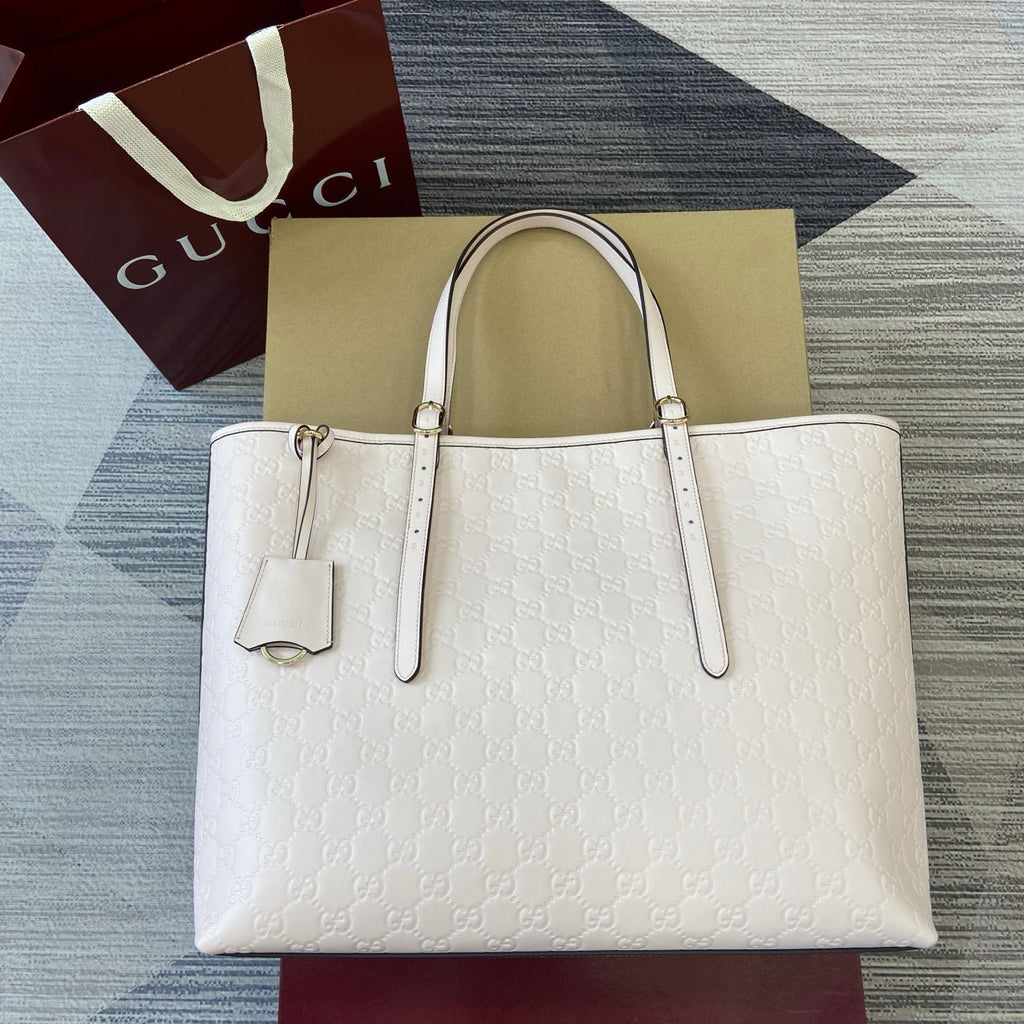 Gucci GG Emblem Debossed Leather Tote #335611