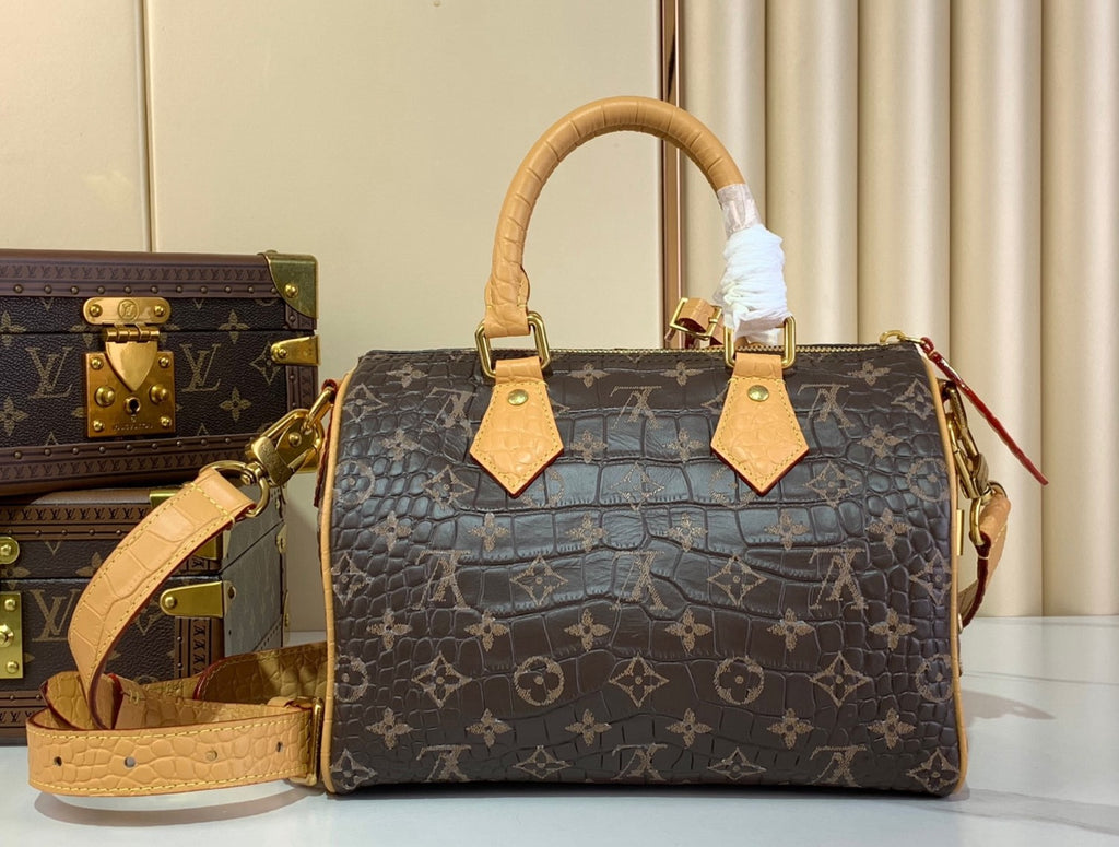 Louis Vuitton Speedy Bandoulière 25 Monogram Leather Handbag Coffee Brown Features Polished Metal Hardware A Lambskin Lining. And An Internal Signature Tag #196001