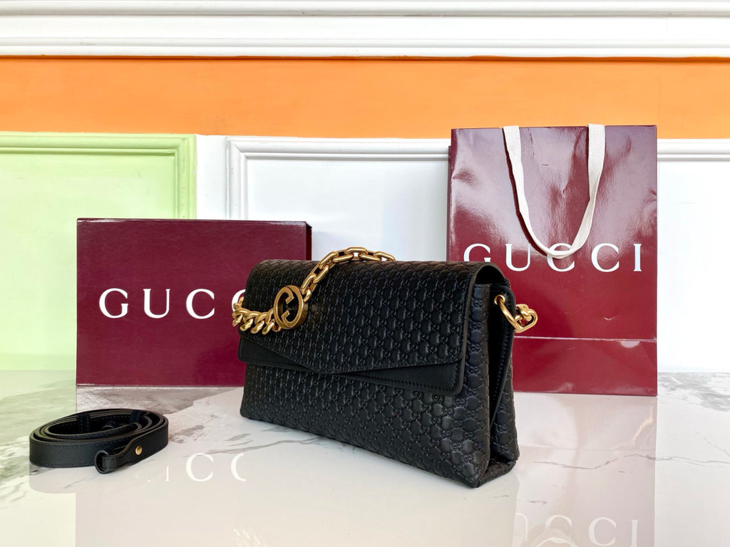 Gucci Medium shoulder bag with chain in black GG leather #336824