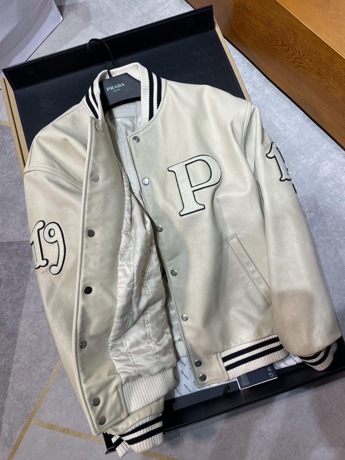 Prada Men's and Women's Spring and Autumn Solid Color Letter Logo Applique Zipper Leather Long Sleeve Jacket #73932