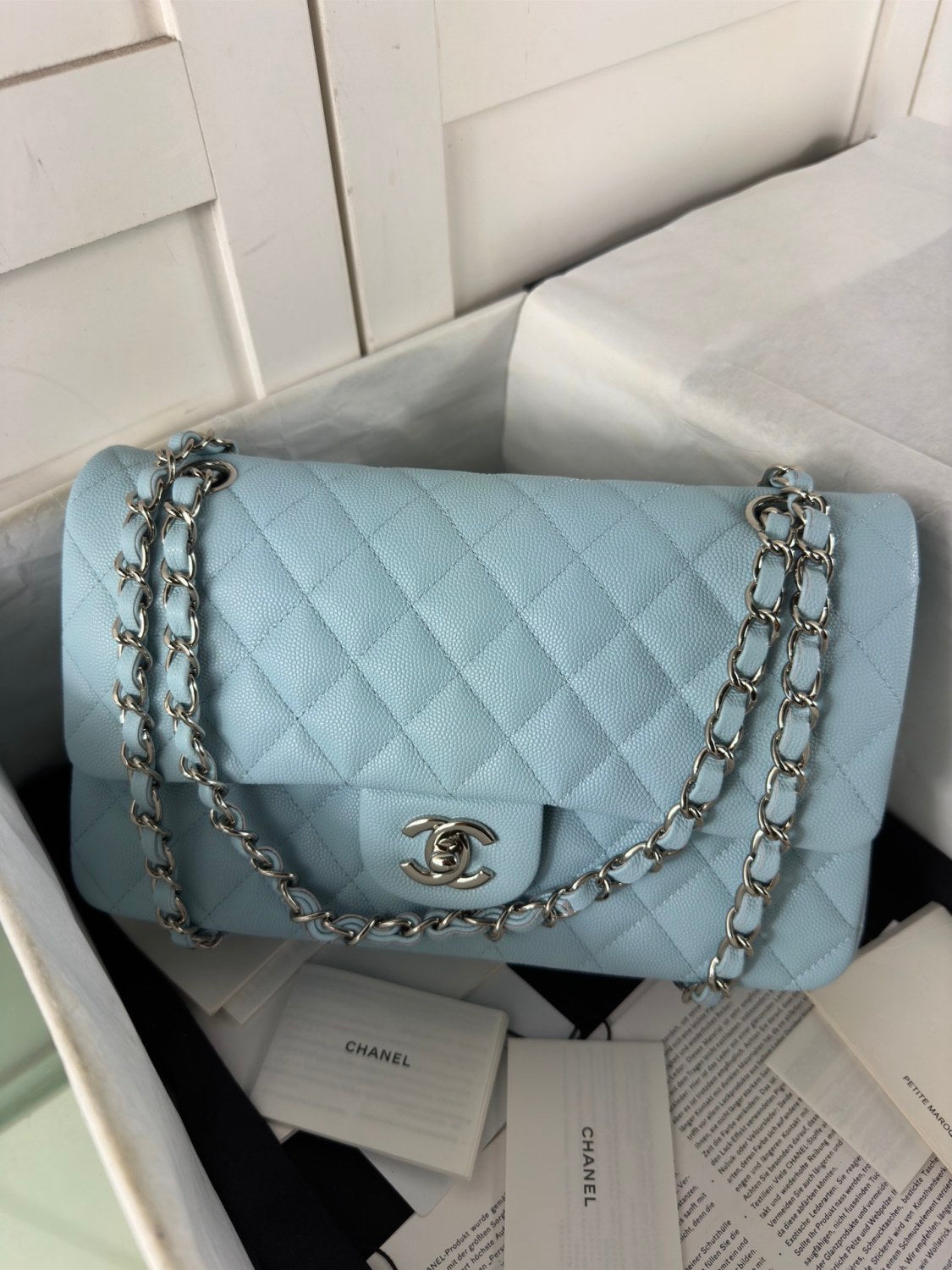 Chanel Classic Medium Flap Bag With A Silver Chain Shoulder Strap A Timeless Versatile Classic Metallic-colored Leather Tends To Fade Easily Lady Bags #197116