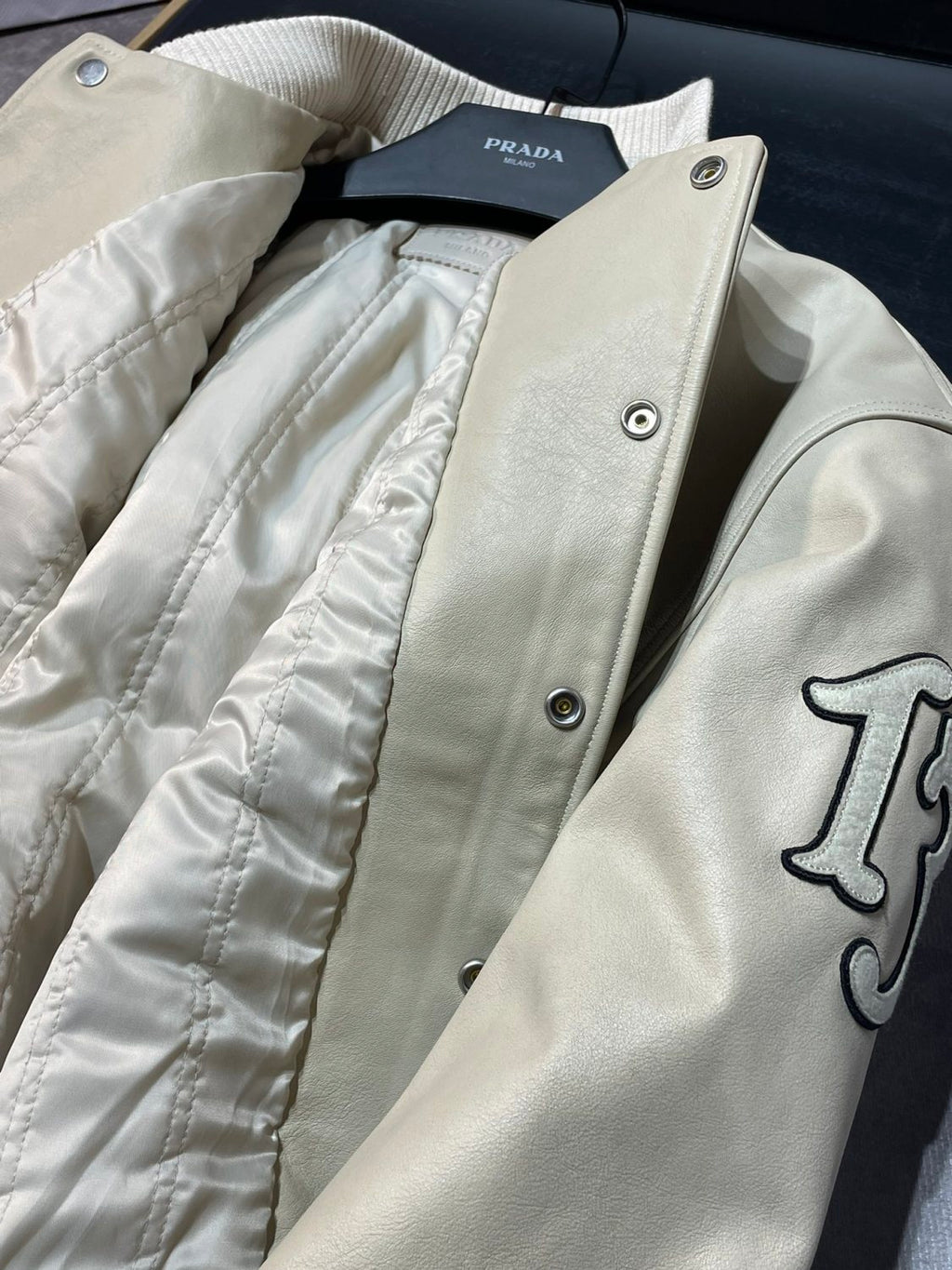 Prada Men's and Women's Spring and Autumn Solid Color Letter Logo Applique Zipper Leather Long Sleeve Jacket #73932