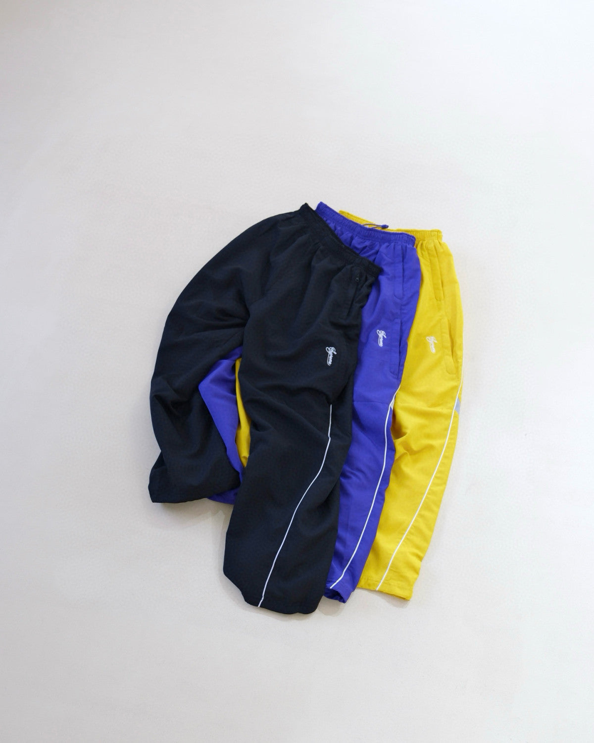 Supreme x Nike Men's Fashionable Cuff Embroidery Zipper Fitted Long-Sleeved Solid Color Sports Jacket Casual Striped Elastic Loose Sports Pants #81521
