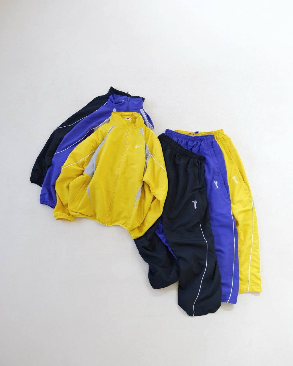 Supreme x Nike Men's Fashionable Cuff Embroidery Zipper Fitted Long-Sleeved Solid Color Sports Jacket Casual Striped Elastic Loose Sports Pants #81521