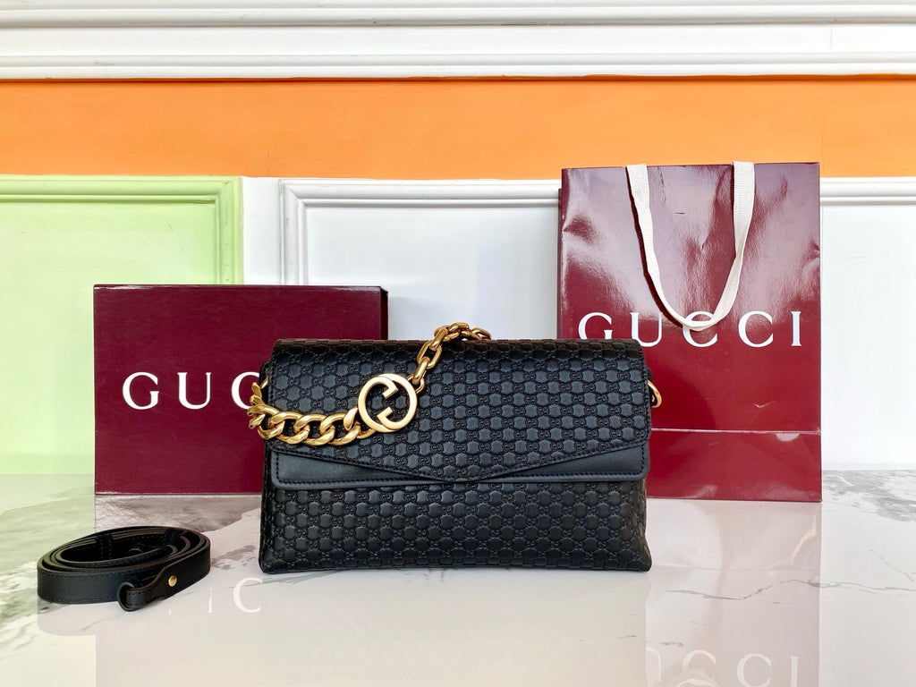 Gucci Medium shoulder bag with chain in black GG leather #336824