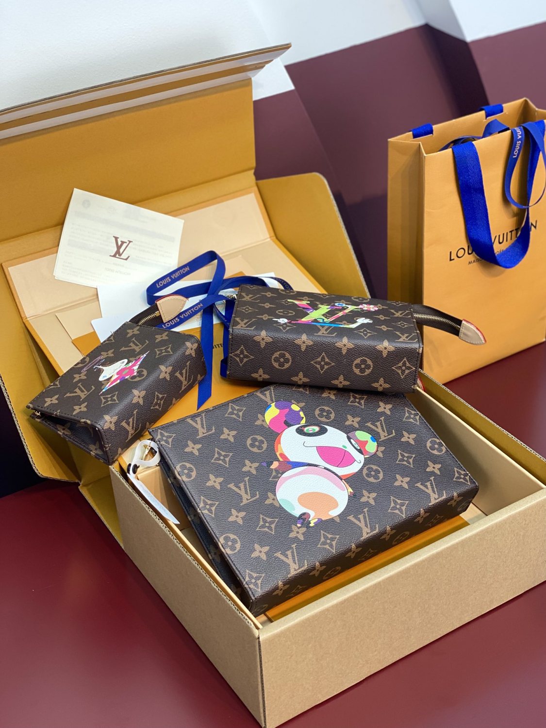 Louis Vuitton LV x TM Women's Solid Color Letter Print Graffiti Pattern Leather Zipper Closure Three-in-One Clutch Bag Bags #77916