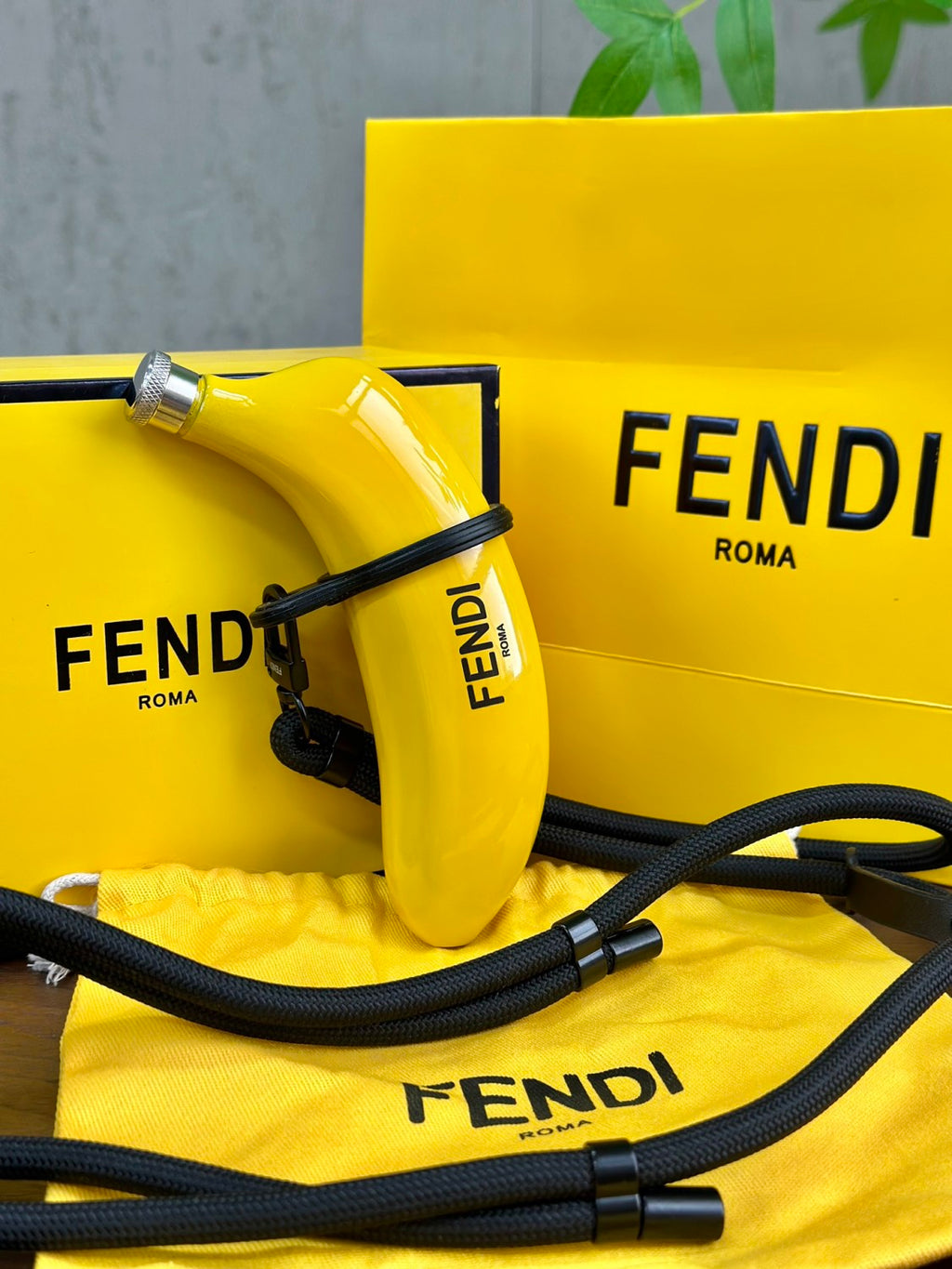Fendi Limited Edition: Limited Stock Available Banana-print Flask Fashionable Mini Crossbody Bag Total Length: 150 Cm. Diameter: 8 Mm. Adjustable From 75 To 150 Cm. Comes In A Complete Gift Box Set Bags #197028