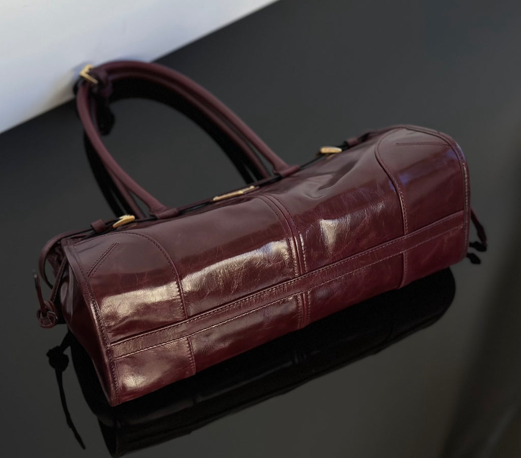 Prada Soft Lux new Bordeaux red motorcycle bag. authentic quality. made of waxed leather. with long handles and a detachable long shoulder strap #83132A