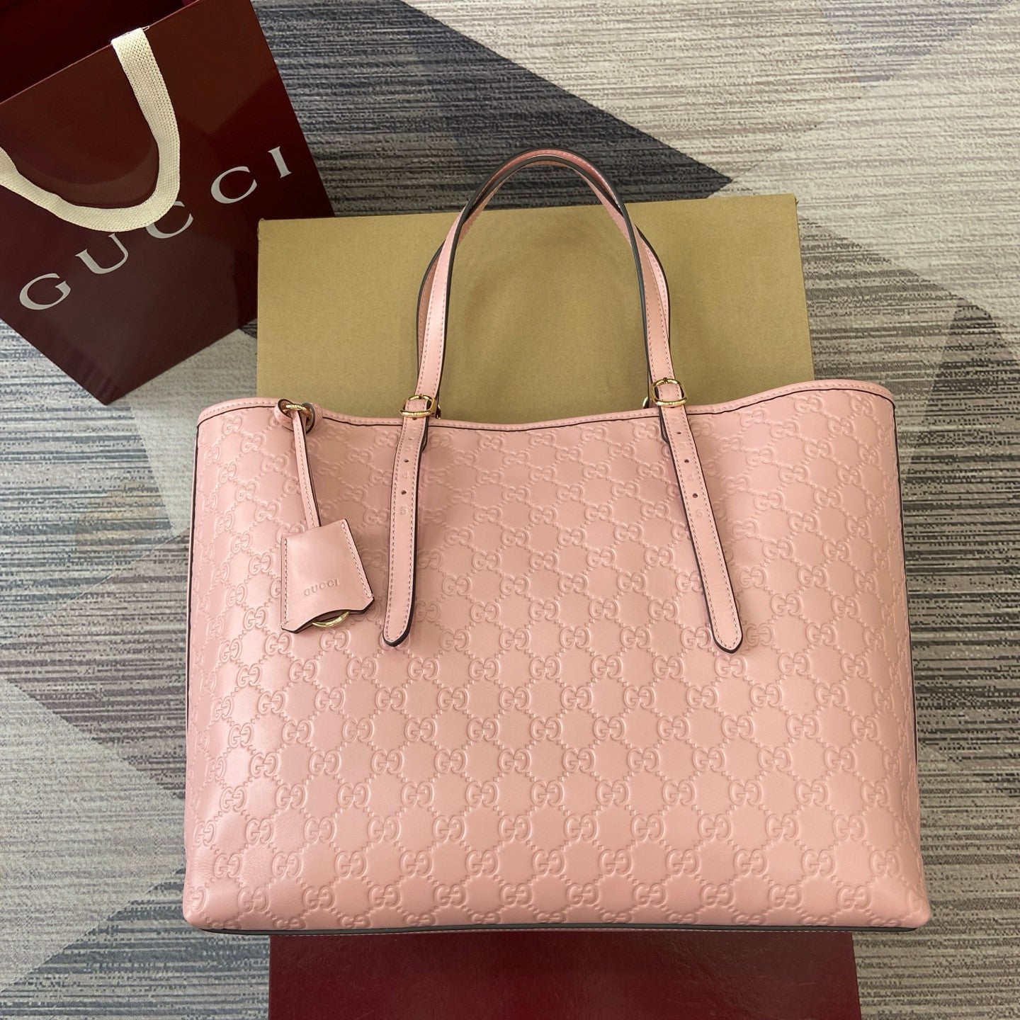 Gucci GG Emblem Debossed Leather Tote #335611