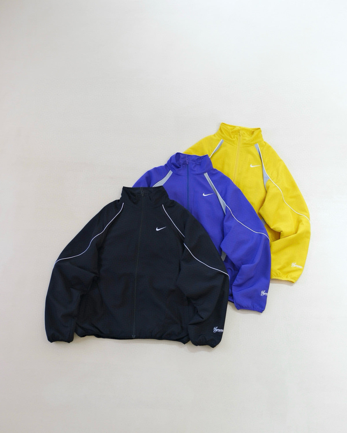 Supreme x Nike Men's Fashionable Cuff Embroidery Zipper Fitted Long-Sleeved Solid Color Sports Jacket Casual Striped Elastic Loose Sports Pants #81521
