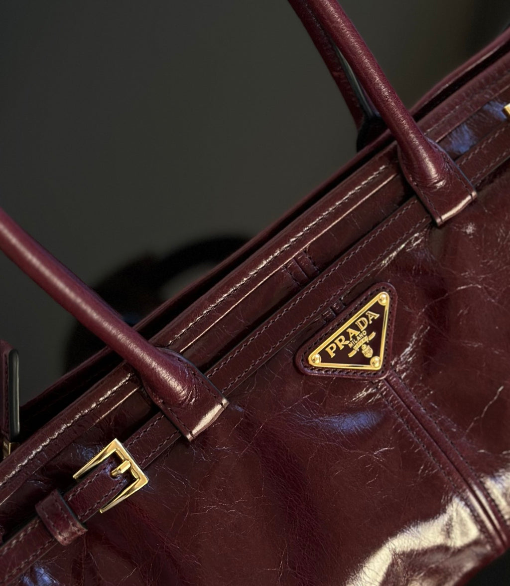 Prada Soft Lux new Bordeaux red motorcycle bag. authentic quality. made of waxed leather. with long handles and a detachable long shoulder strap #83132A
