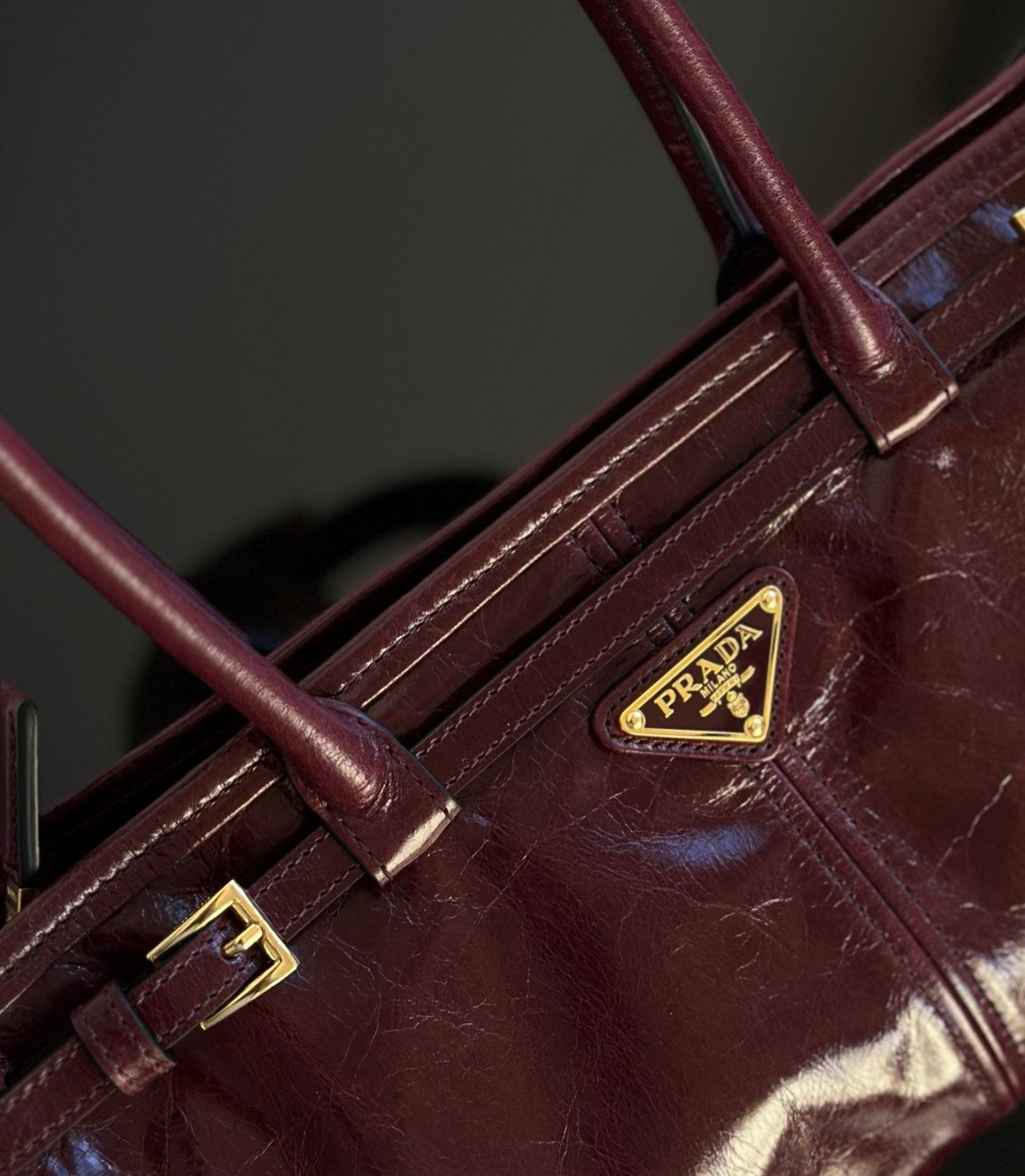 Prada Soft Lux new Bordeaux red motorcycle bag. authentic quality. made of waxed leather. with long handles and a detachable long shoulder strap #83132A