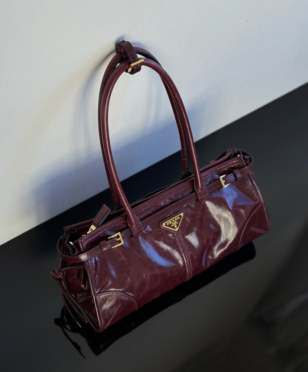 Prada Soft Lux new Bordeaux red motorcycle bag. authentic quality. made of waxed leather. with long handles and a detachable long shoulder strap #83132A