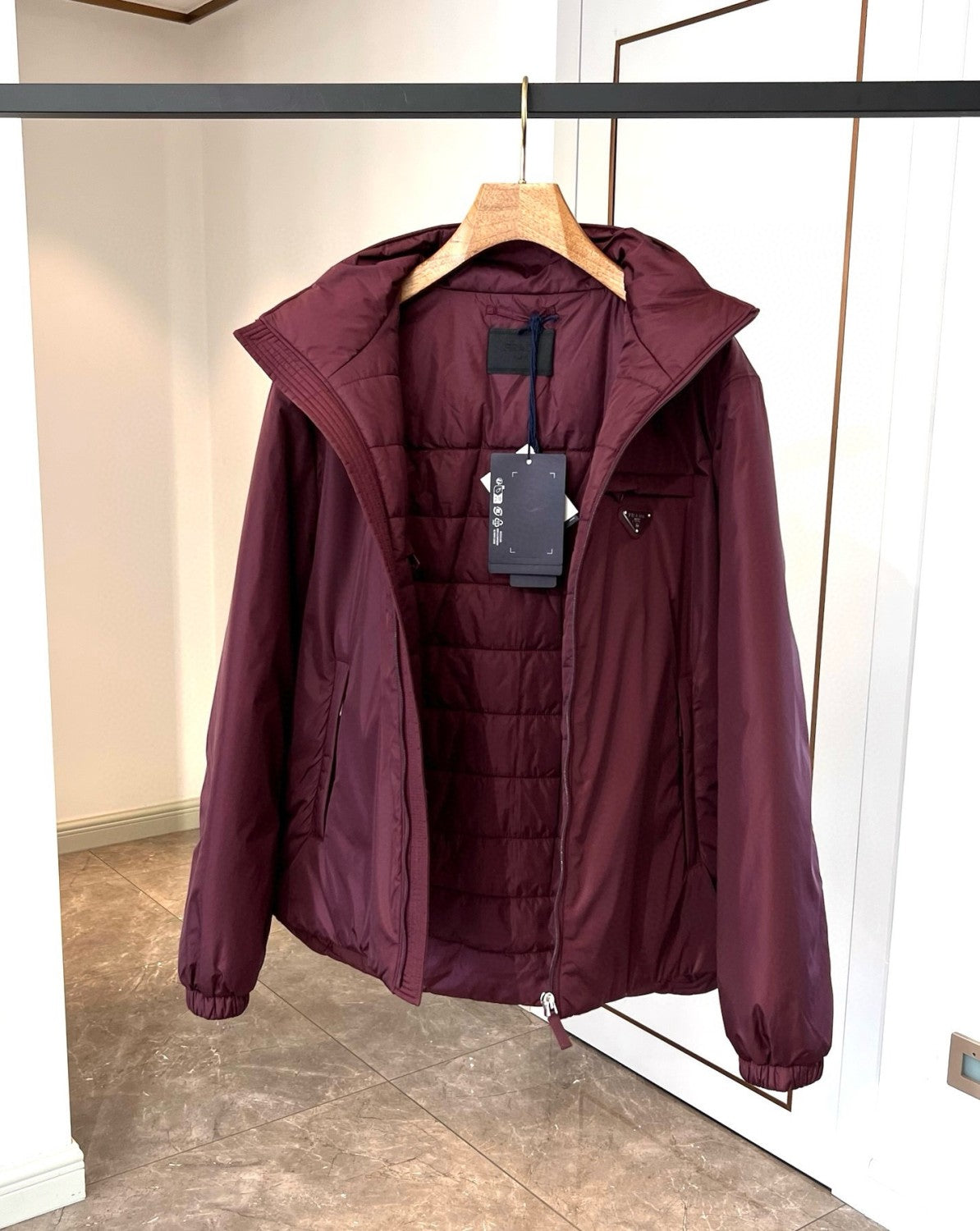 Prada Men's Autumn and Winter Solid Color Single Breasted Hooded Nylon Puffer Down Long Sleeve Jacket #73912